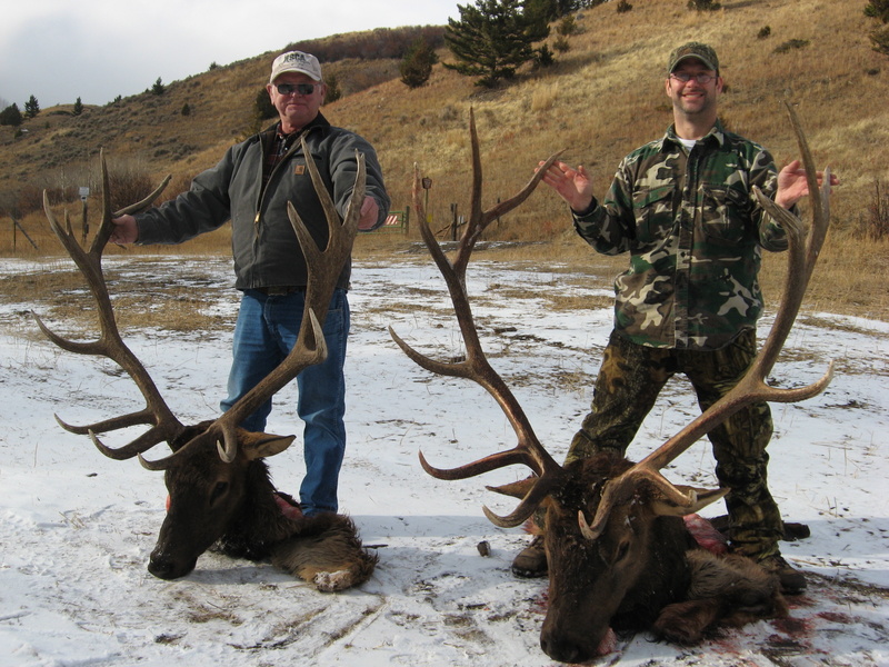 Hunters with large elk
